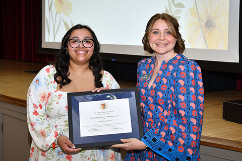 A female student award winner and Molly Place