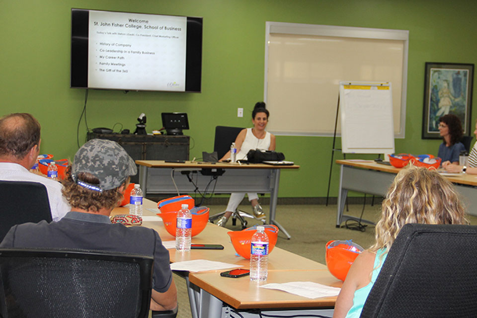 Stefani LiDestri, co-president of LiDestri Food and Drink, talks with members of Fisher's Family Business Next Generation Leadership Program.