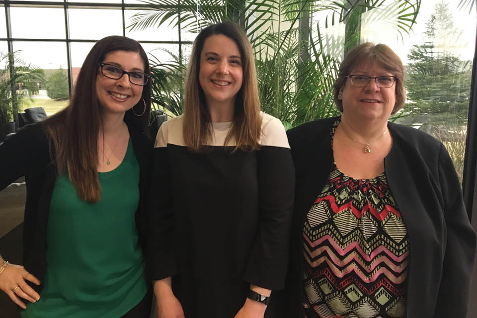 Three female Fisher graduates at Paychex