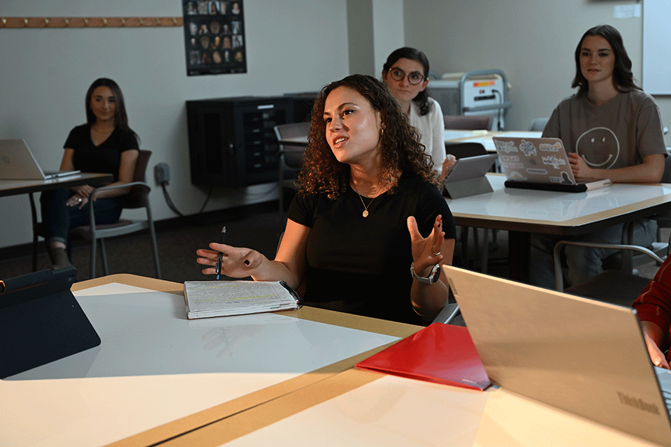 A student talks during class.