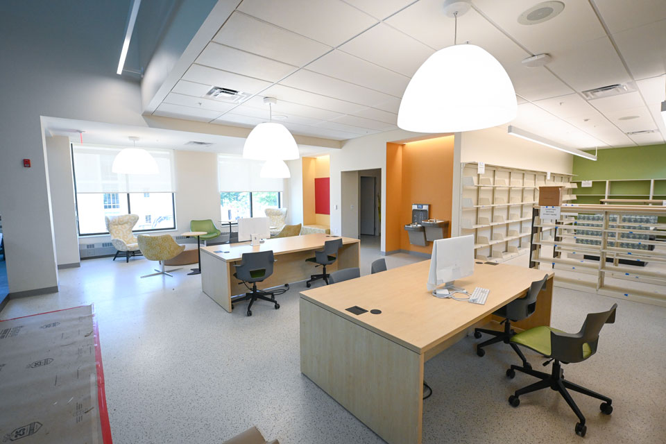 An interior view of Lavery Library it outfitted with desks and bookshelves.