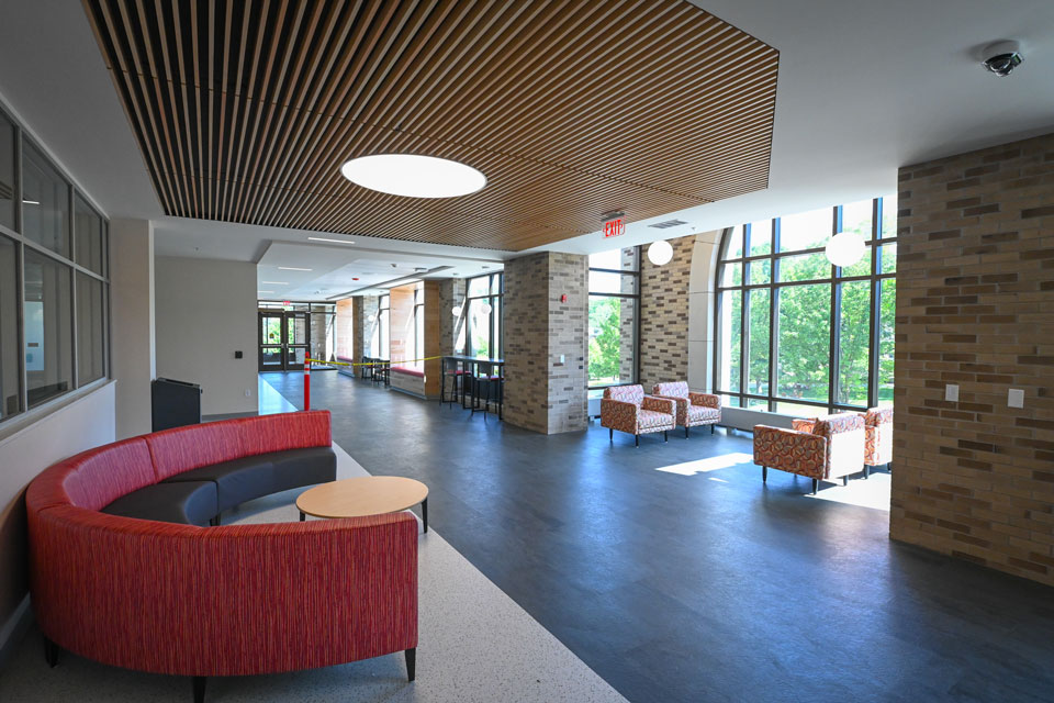 The walkway of Lavery Library, known now as The Spine, includes comfortable seating and tables overlooking LeChase Commons.