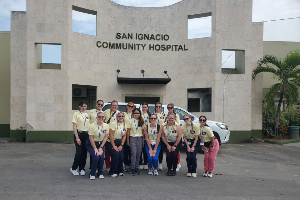 Wegmans School of Nursing students in front of a medical clinic in Belize.