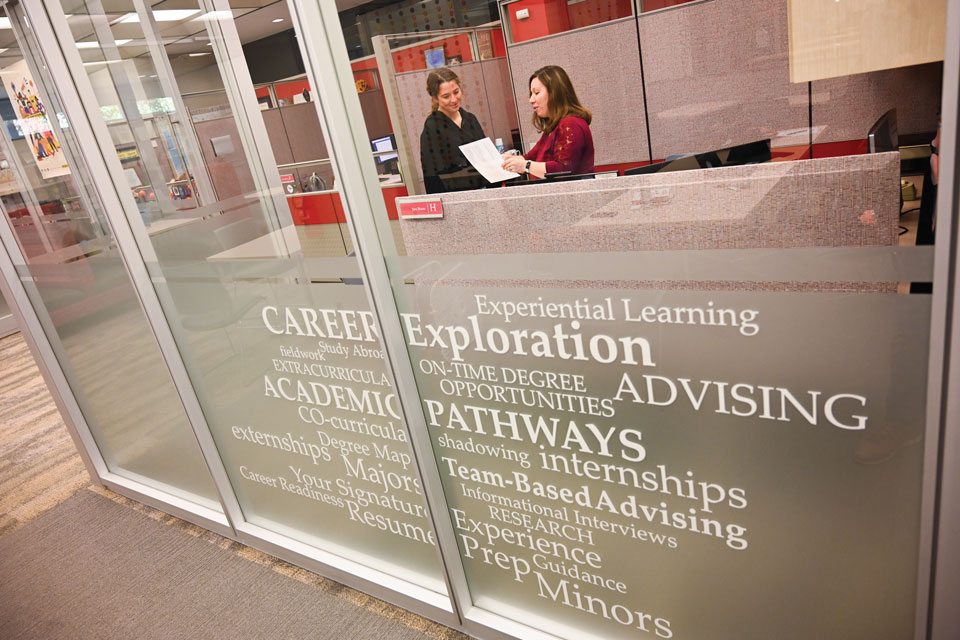 A student receives guidance at the Career Center.