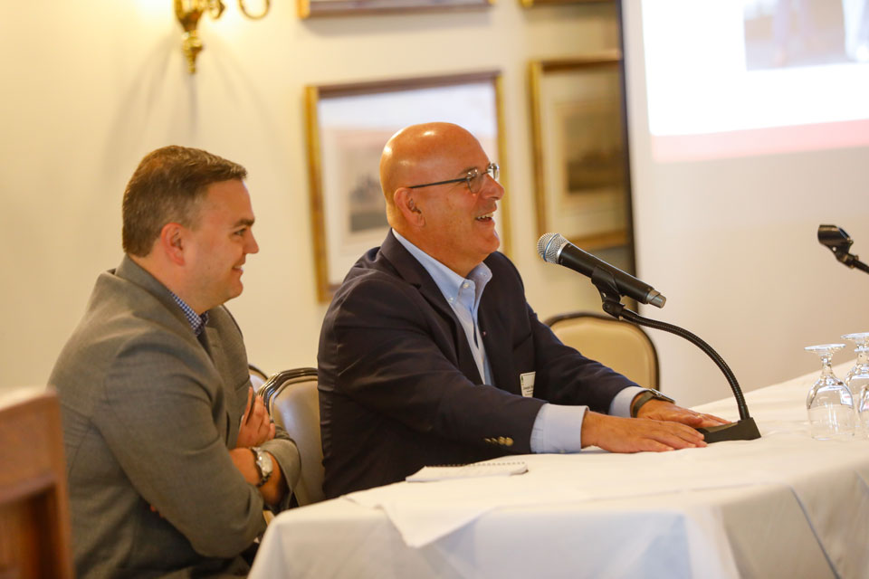 Jason Mirabito (left) and John Mirabito (right) talk at the family governance forum.