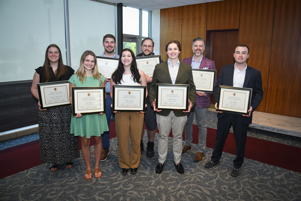Next Generation Leadership Institute cohort members with their completion certificates.