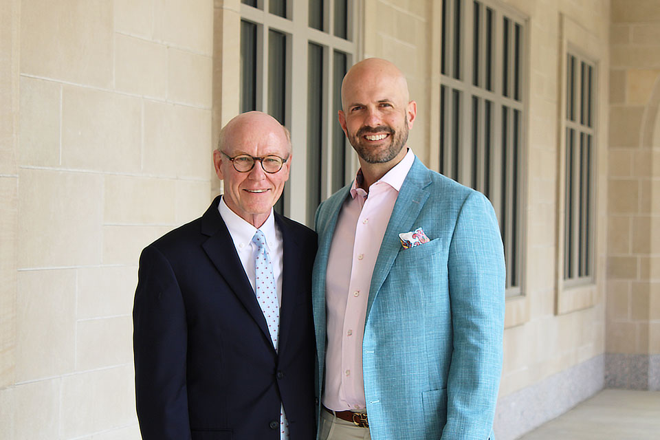 President Gerard J. Rooney and Justin Hamilton