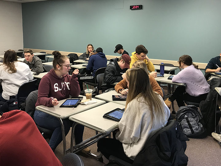 Students using iPads in the classroom.