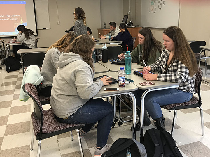 Students using iPads in the classroom.