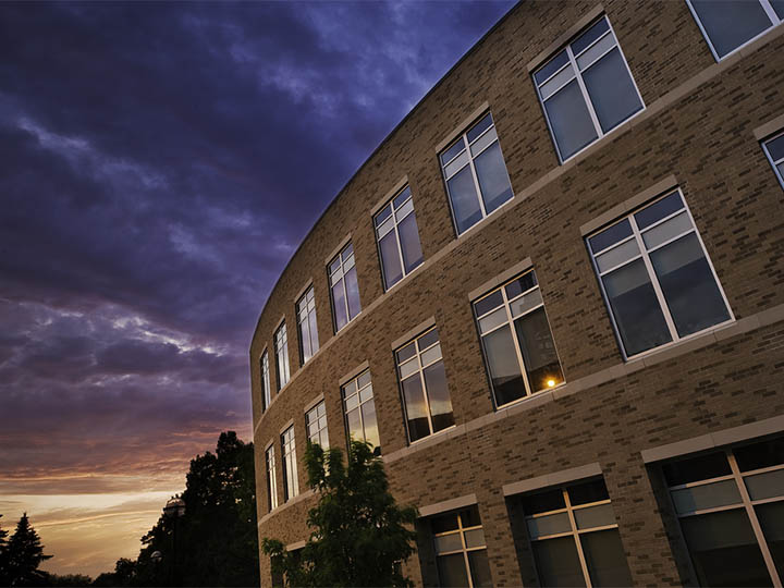 The Wegmans School of Pharmacy at dusk.