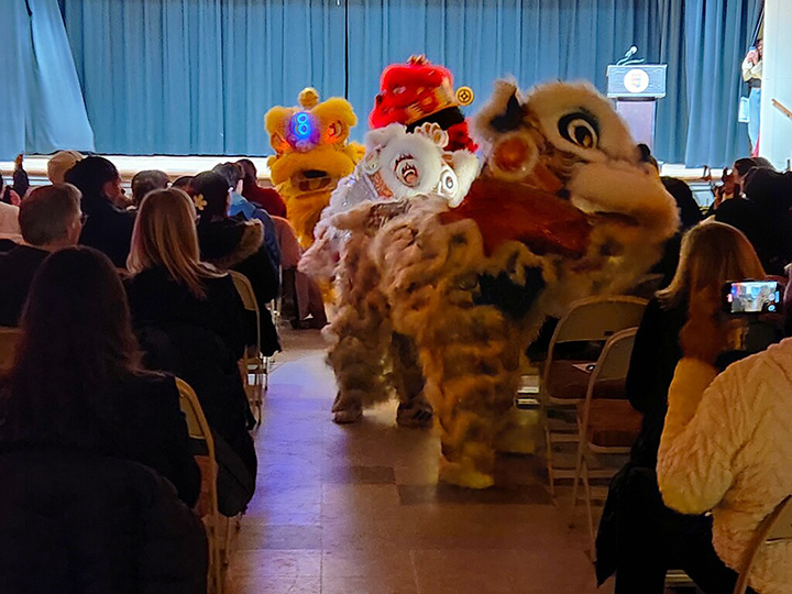 Students participate in a costumed dance during Festival of Nations event.