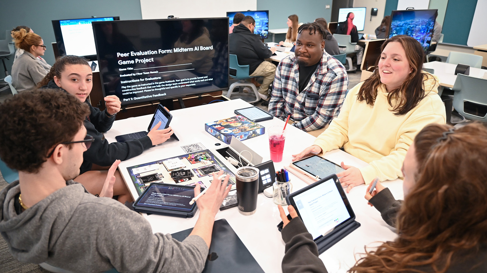 Students in class using Apple technology.
