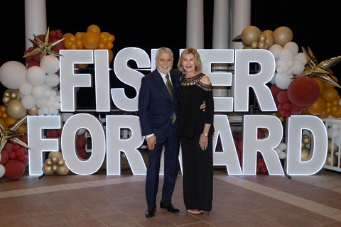 Donors in front of the Fisher Forward sign