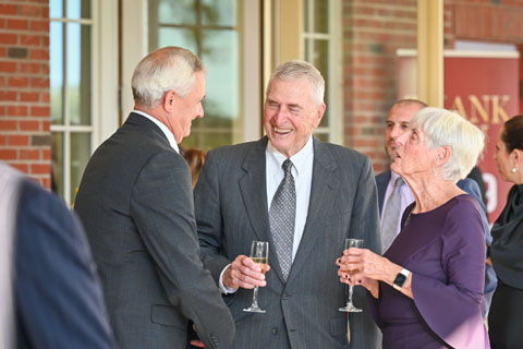 Alumni connecting at the Fisher Forward event