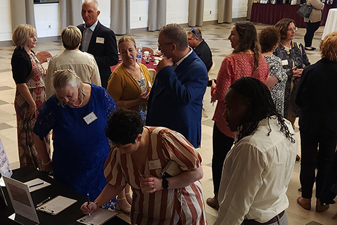 Light up the Night attendees view items of the silent auction.