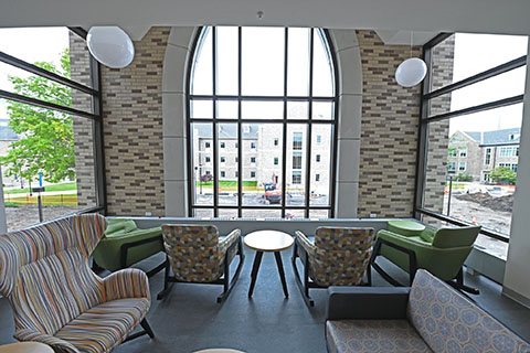 A new seating area near a large window in Lavery Library.