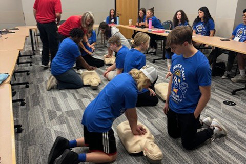 Students learn CPR.