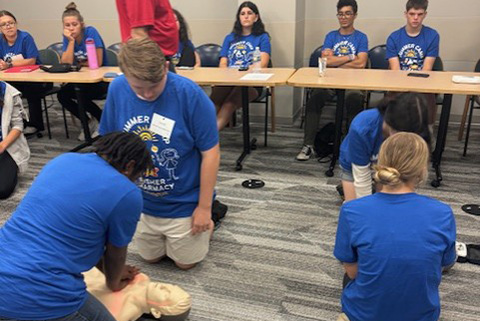 Students learn CPR.