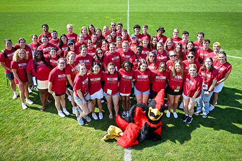 Orientation Team posing together with Beaks.