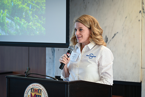 A presenter at a women in family business event.