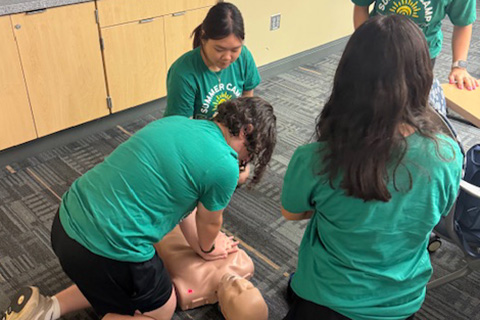 Students learn CPR.