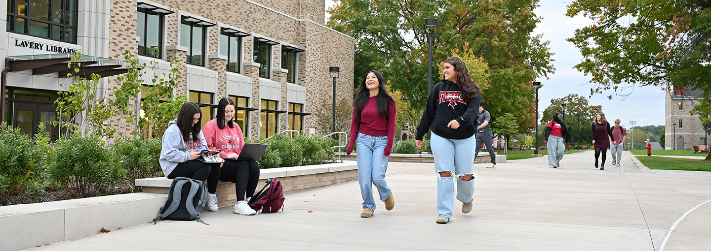 Students walk on campus near Lavery Library.
