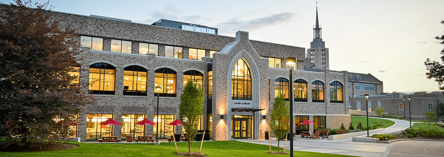 Lavery Library brightly lit in the evening.