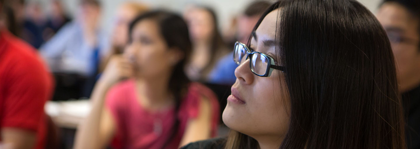 Side view of student in pharmacy class.