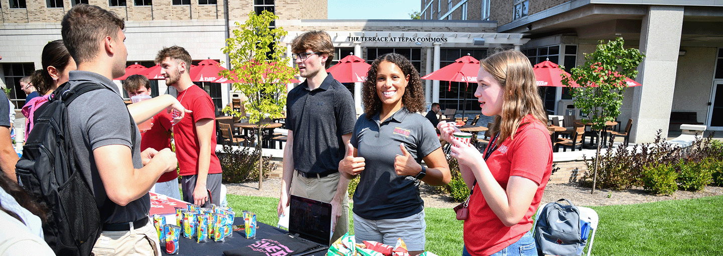 Students recruit club members during Involvement Fest.