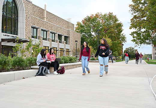 Students walk together near Lavery Library.