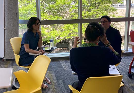 Faculty participate in active learning session for classroom technologies.