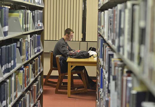 Student in library