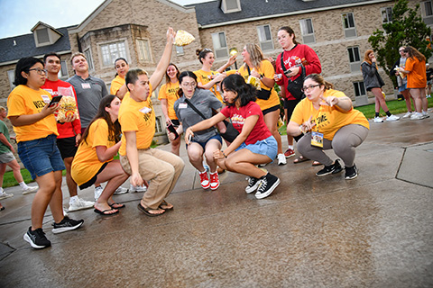 A large group of students dancing during Welcome Weekend.